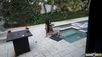 Tattooed Brunette Takes Care Of BBC Next To Swim Pool