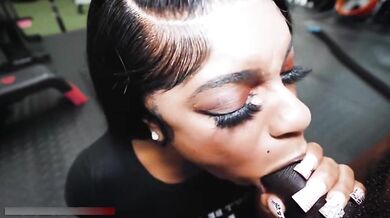 Watch this ebony babe workout with her big black ass and tight pussy in the gym