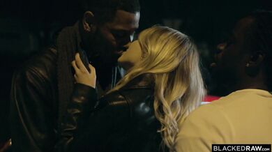 Stunning blonde babe takes two massive black cocks at once in a hardcore DP session